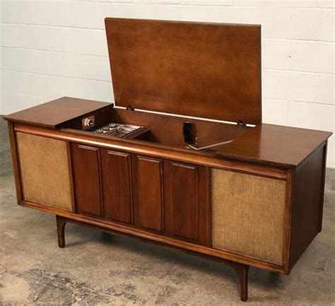 Refurbished with Bluetooth capability. . Refurbished stereo console